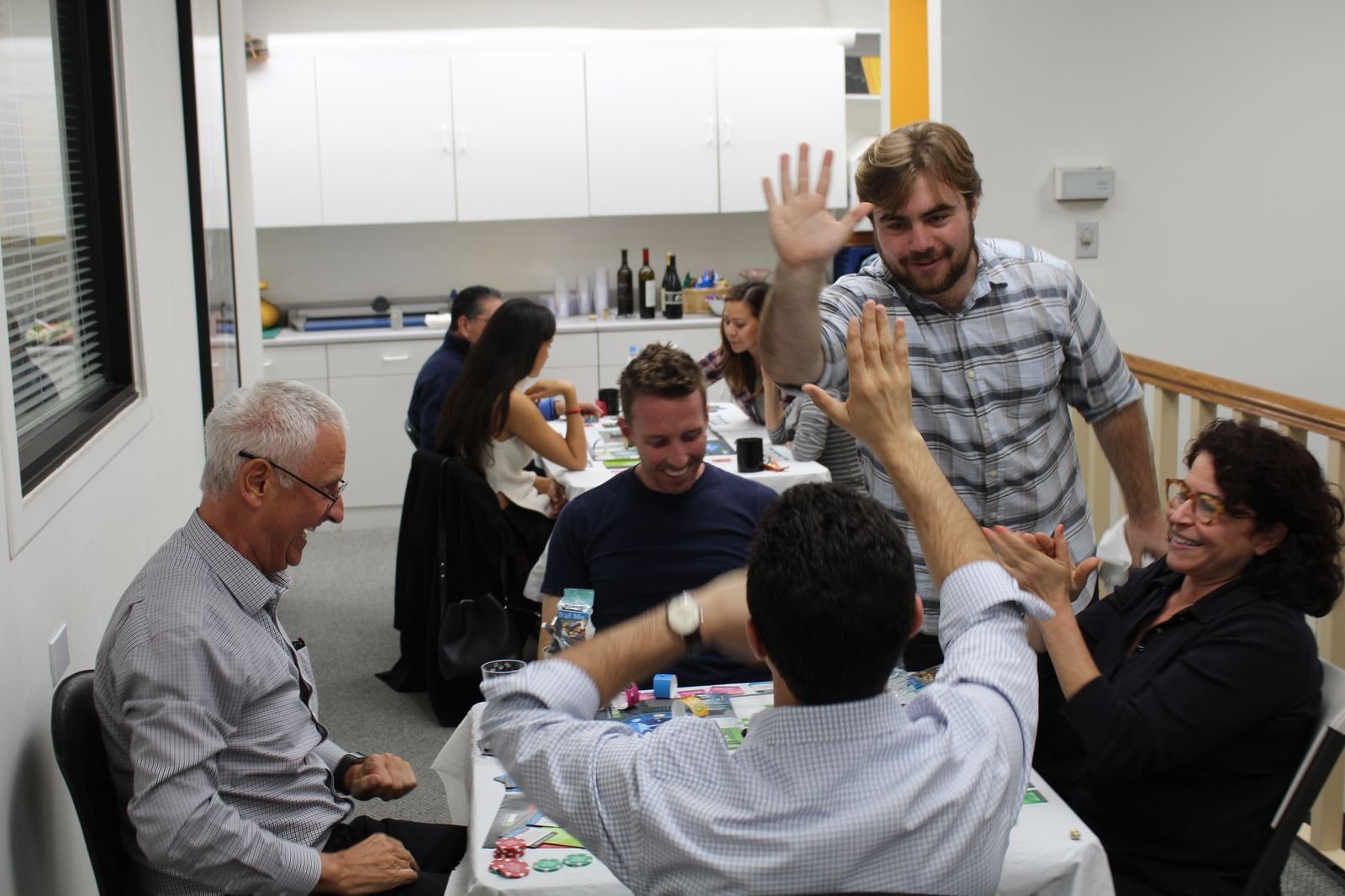 Team engaged in a game-based leadership session